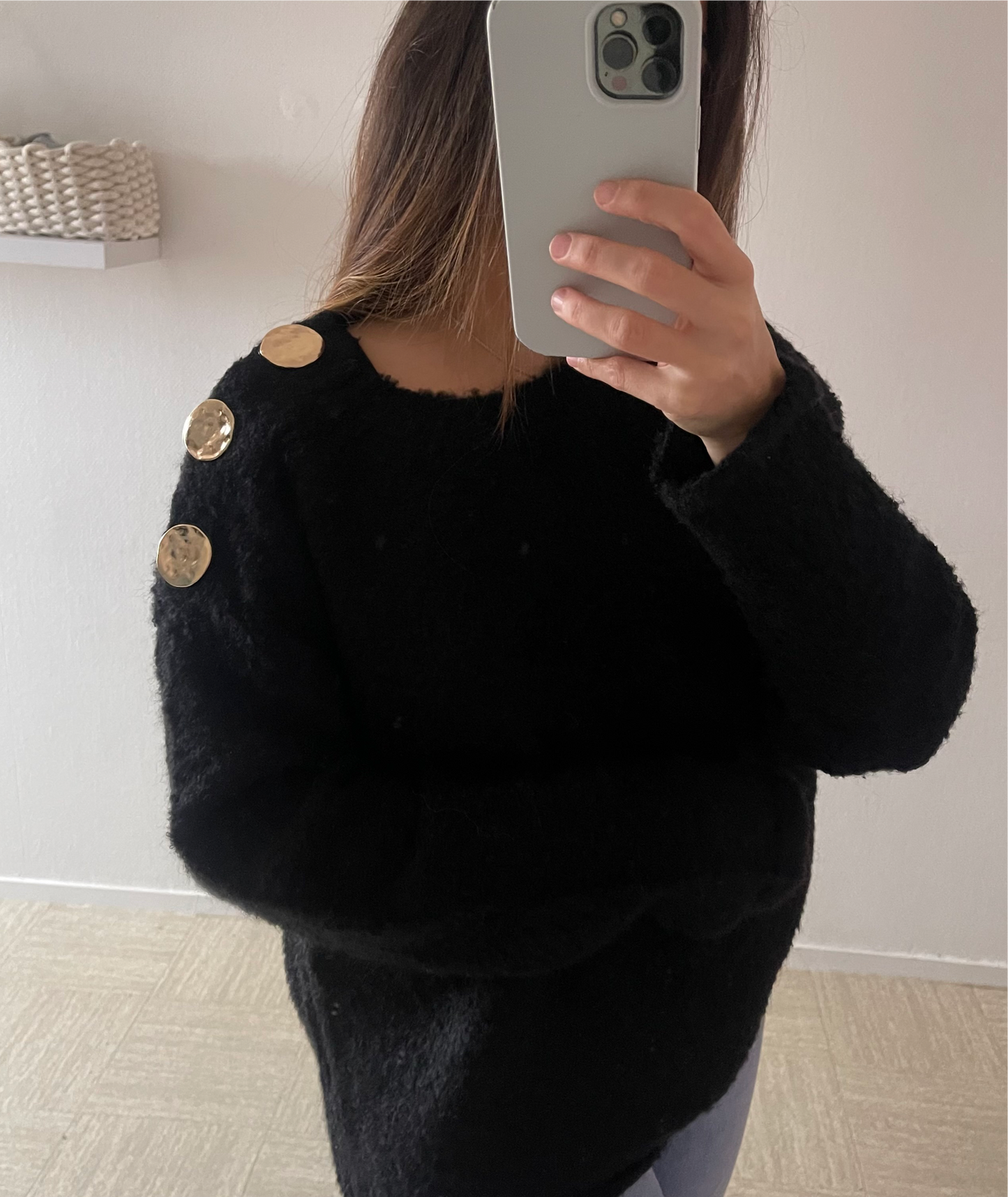 Pull à épaules boutonnière