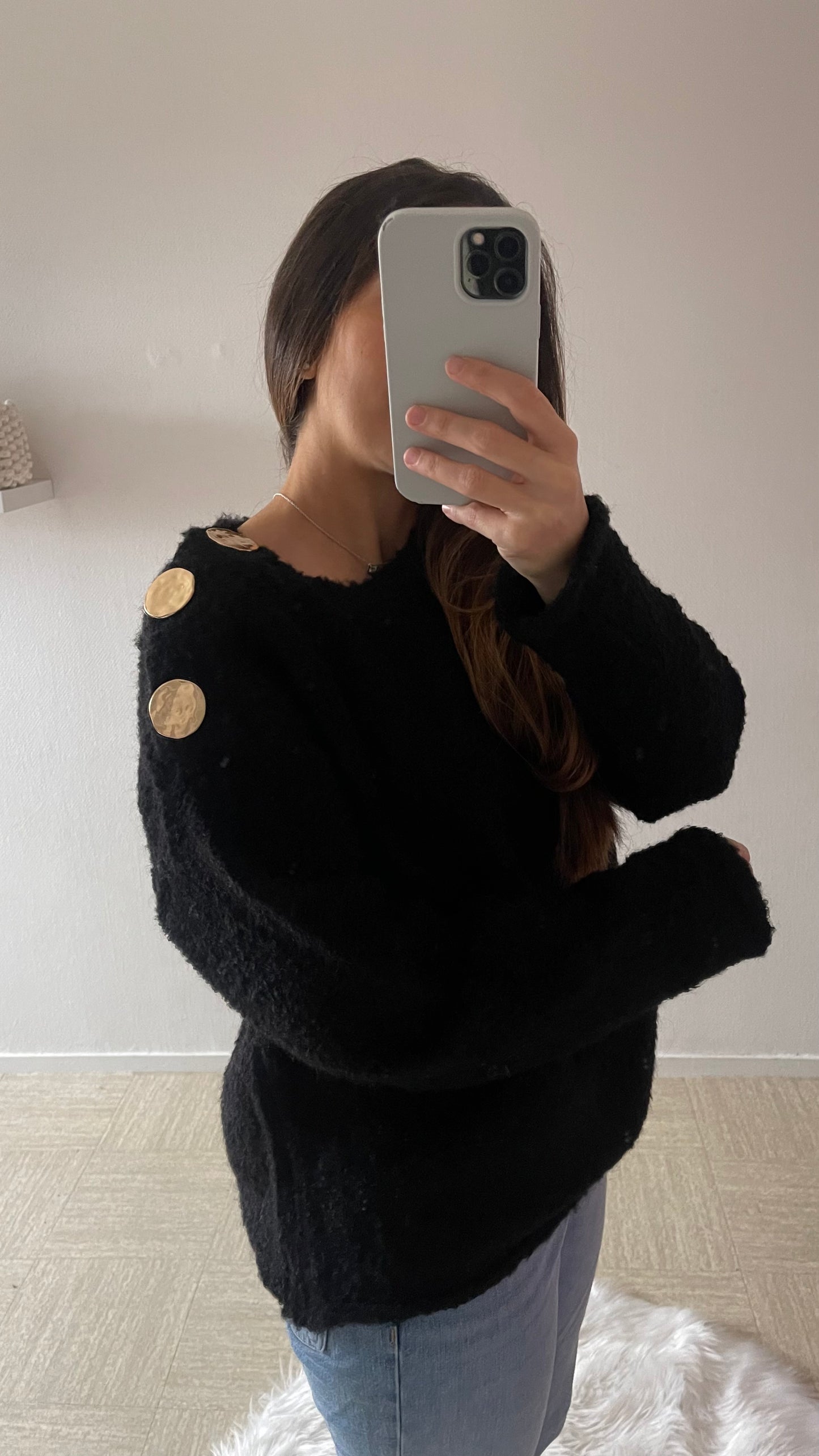 Pull à épaules boutonnière